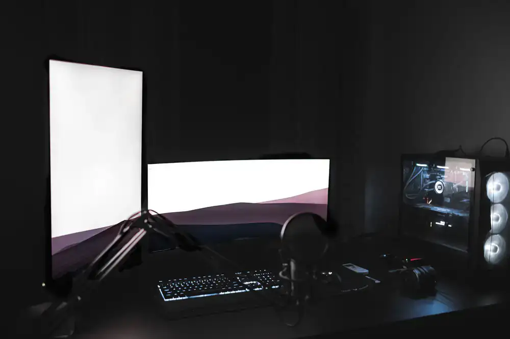 Professional gaming and streaming setup with dynamic lighting